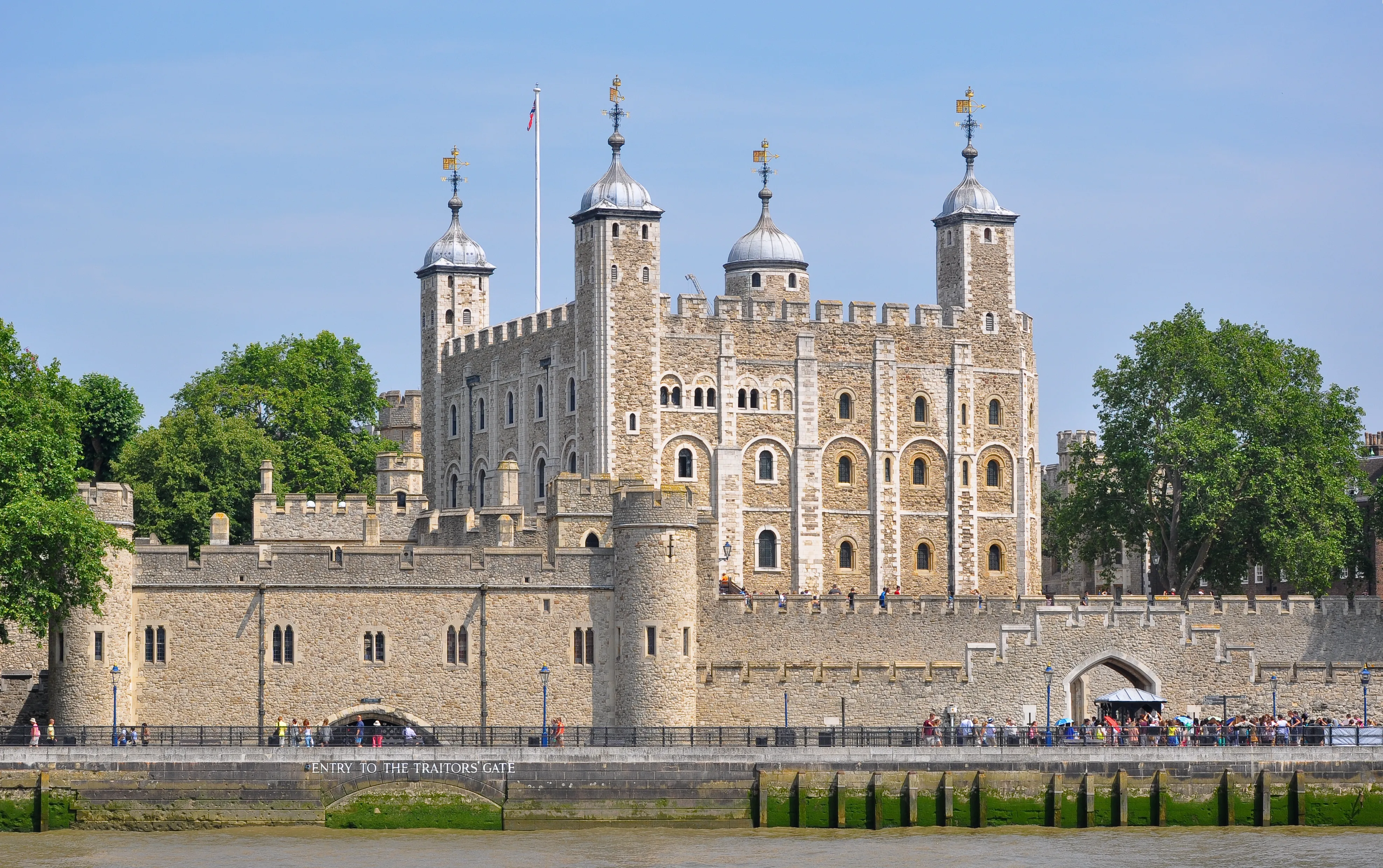 Riverside view of the Tower of London and outer walls